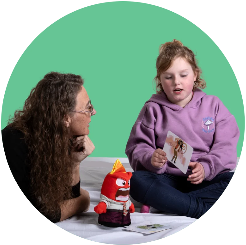 Tammy talking with a young client